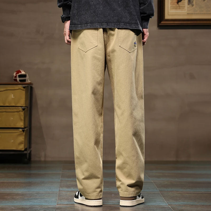 Kaki losse rechte cargo jogger broek van katoenmix met elastische tailleband en achterzakken.
