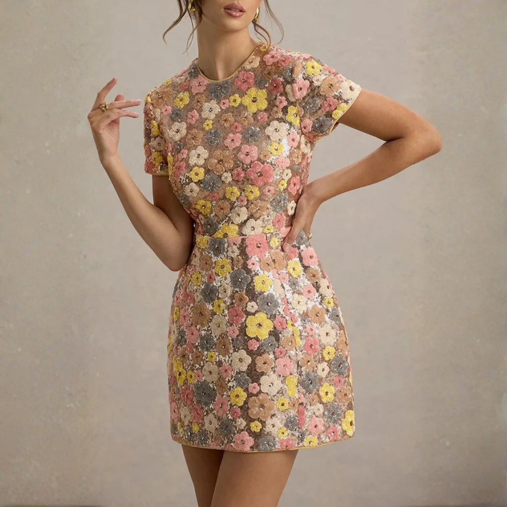 Elegante mini-jurk met korte mouwen, ronde hals en kleurrijk bloemenpailletten-patchwork.