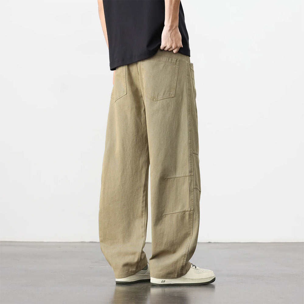 Retro losse workwear broek van beige katoen met knoop- en ritssluiting.