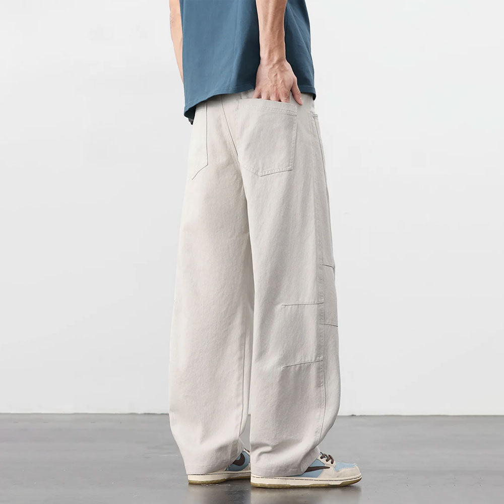 Beige retro katoenen workwear broek met losse pasvorm en cargozakken.